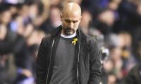 FA charges Guardiola for wearing Catalan support ribbon