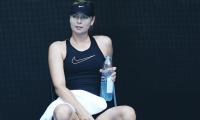 Struggling Sharapova splits with coach