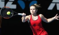 Aus Open PHOTOS: Halep, Kerber to clash in semis after easy wins