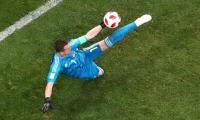 Russian keeper thanks God for luck against Spain