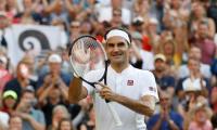 Wimbledon PHOTOS: Federer marches on; Venus, Keys crash out