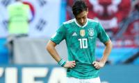 Ozil's departure draws mixed response