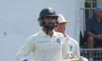 Karthik hits 82 not out, Kohli among runs in India's 322/6 on Day 1