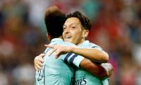 Ozil shines on return as Arsenal crush PSG in Singapore