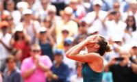 PHOTOS: Emotional Halep finally realises Major dream