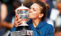 Halep fights back to finally clinch French Open crown