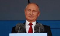 Defiant Putin welcomes World Cup as Russia win