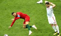 Spain's Pique accuses Ronaldo of diving after thrilling draw