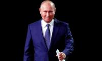 President Putin revels in Russia's unexpected World Cup form