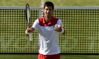 Djokovic says not among favourites at Wimbledon, backs Federer