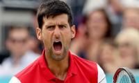 Djokovic plays down Wimbledon chances