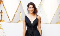 Che Bella! Wimbledon champ Muguruza scorches red carpet at the Oscars!