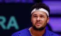 Tsonga defies doctor to battle on, but all in vain