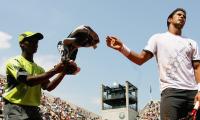 Respect ball kids, Federer tells fellow pros