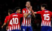 Football Roundup: Atletico go top of La Liga