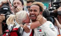 Mature Hamilton humbled by winning a fifth F1 title