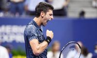 PIX: 57 rallies, high humidity -- Djokovic ground by Millman before win