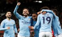 City take big step towards title; Arsenal's hopes dented