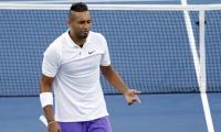 Kyrgios mostly keeps his cool to see off Hoang