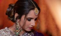 Sania Mirza looks mesmerising in this purple lehenga