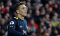 Extras: China cancels Arsenal game after Ozil hits out