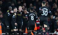 EPL PIX: City down Arsenal, United held