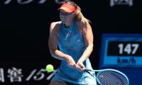 Sharapova sets up mouth-watering Wozniacki clash