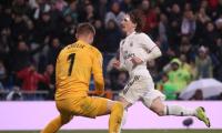 Football Extras: Real Madrid go third with win over Sevilla; PSG hit 9