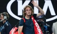 Dejected Tsitsipas bows out but Greek fans proud