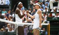 PHOTOS: Halep ends Gauff's Wimbledon dream