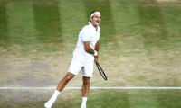 Federer downs Nadal to enter his 12th Wimbledon final