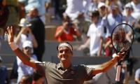 French Open PIX: Federer, Nadal waltz into last 8