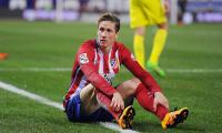 Soccer Extras: Spain striker Torres retires