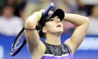 PICS: Andreescu sees off Mertens to make US Open semis