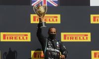 F1 PIX: Hamilton wins British GP with punctured tyre