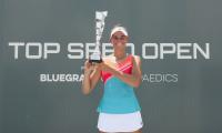 Tennis returns to US as Brady claims first WTA title