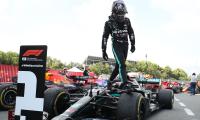 Dazed Hamilton takes dominant win in Spain