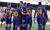 Barcelona sneak past Getafe to keep pressure on Real