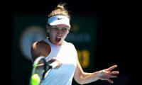 Frustrated Halep happy to advance in Melbourne