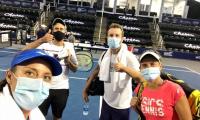 With elbow bumps, masks, World TeamTennis kicks off