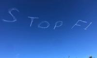 Sydney skywriting says 'STOP F1' amid virus fears