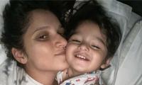 Sania Mirza cuddles with her son in bed