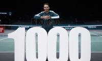 Nadal survives scare in Paris to claim 1,000th win