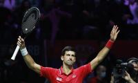 Inspired Djokovic powers Serbia into Davis Cup semis