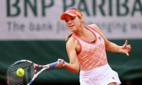 Jittery champion Kenin brushes off leg injury concerns