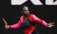 Serena channels Olympic champ FloJo with catty outfit