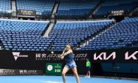 Crowd buzz missing as players grind it out at Aus Open