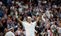 Golden oldie Federer through to 58th Slam quarters