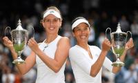 Hsieh wins third Wimbledon doubles title