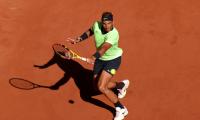 Nadal in his element in warm, sunny Roland Garros